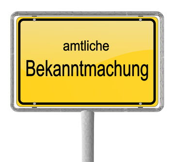 Das Foto zeigt ein gelbes Ortseingangsschild. Darauf steht: Amtliche Bekanntmachungen.