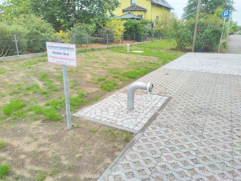 Freianlagen und Bau unterirdischer Löschwasserbehälter im OT Zabeltitz am Triftweg - Fertigstellung der Fläche unterird. Löschwasserbehälter mit Bezeichnung, Aufnahme 03062024